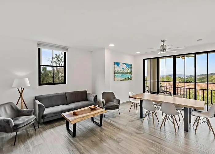 Stunning Top-Floor Condo With Sweeping Ocean & Mountain Views & Beach Club