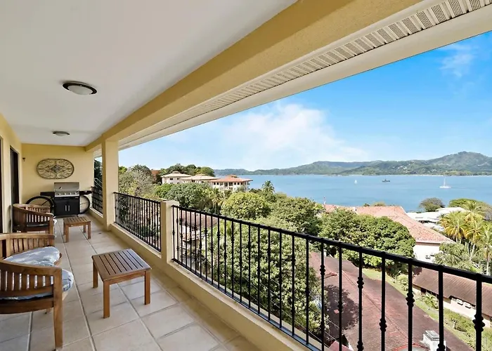 Remodeled Top-Floor Condo With Stunning Wrap-Around Balcony Offering Mountain, Ocean & Marina Views