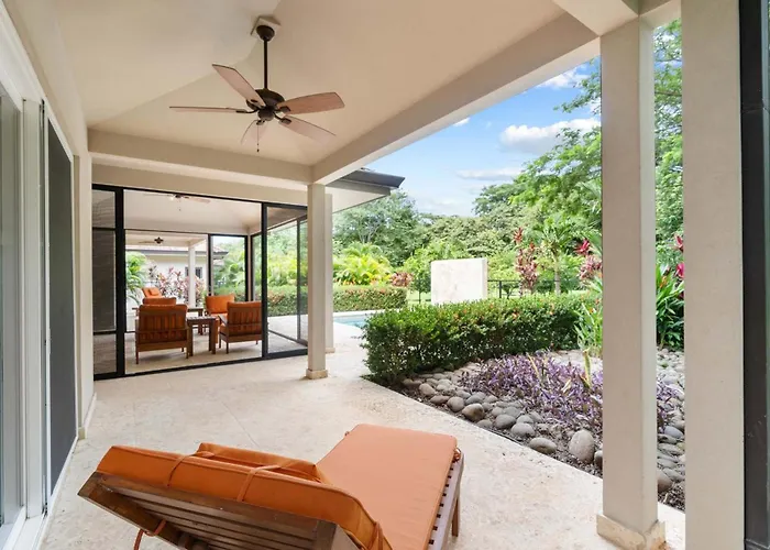 Beautiful Home In A Gated Neighborhood Walking Distance To The Beach With Garden Views And A Pool