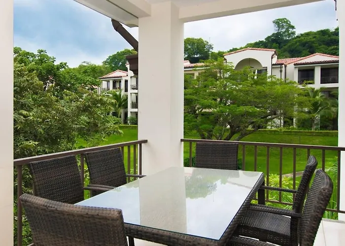 Coastal-Inspired Condo With A Pool-View Balcony & Beach Club Access