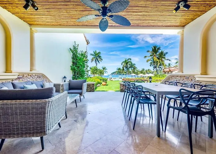 Stylish Split-Level Condo With A Shaded Terrace, Direct Beach Access, And Resort-Style Community Amenities