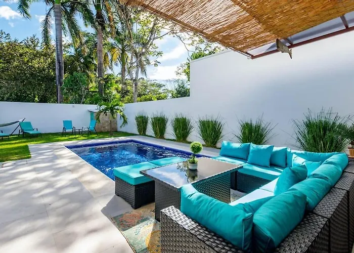 Ultramodern Townhome With An Inviting Coastal Design And Lush Outdoor Oasis With A Private Pool
