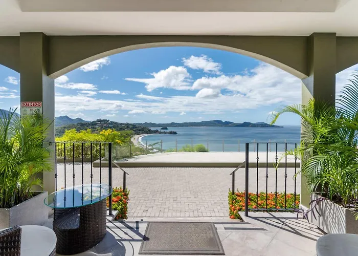 Luxury Condo With Panoramic Ocean Views, Sparkling Infinity Pool, And Modern Open-Concept Design